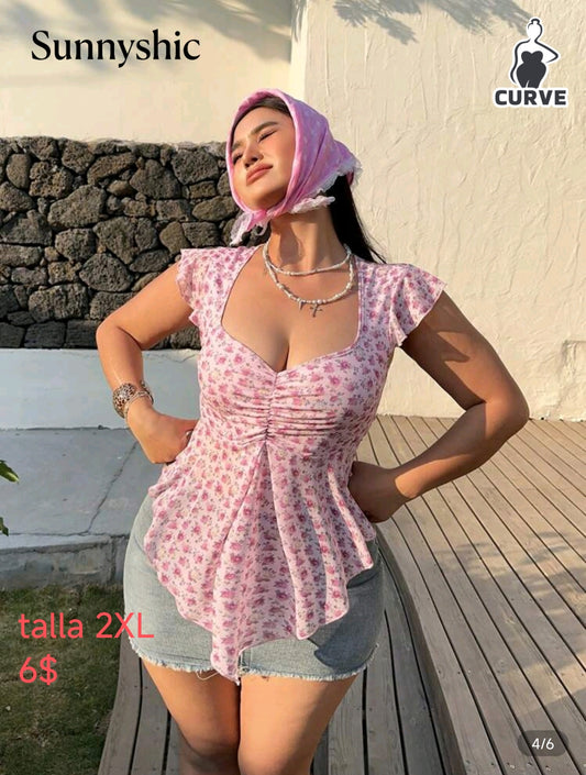 Camisa rosada de flores